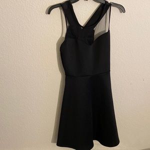 Black cocktail dress with bow on the back